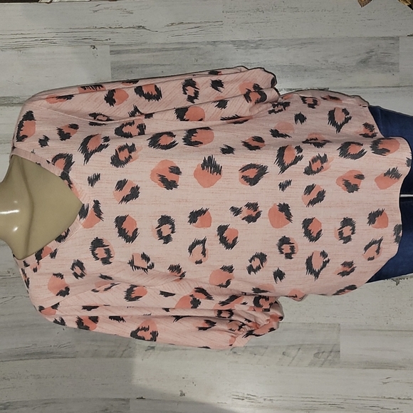 LuLaRoe Tops - LULAROE PINK ANIMAL PRINT BLOUSE
